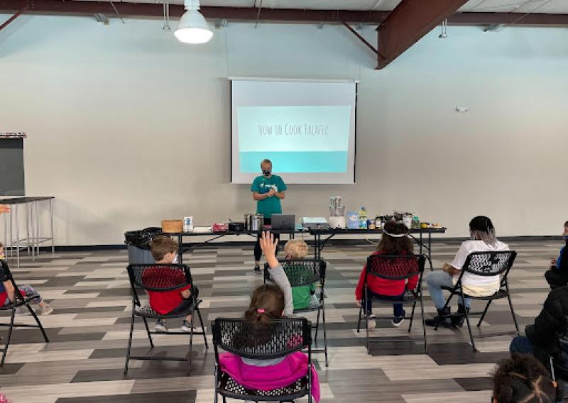  Teaching a healthy cooking class focused on international foods to the youth at the YMCA winter break camp. 
